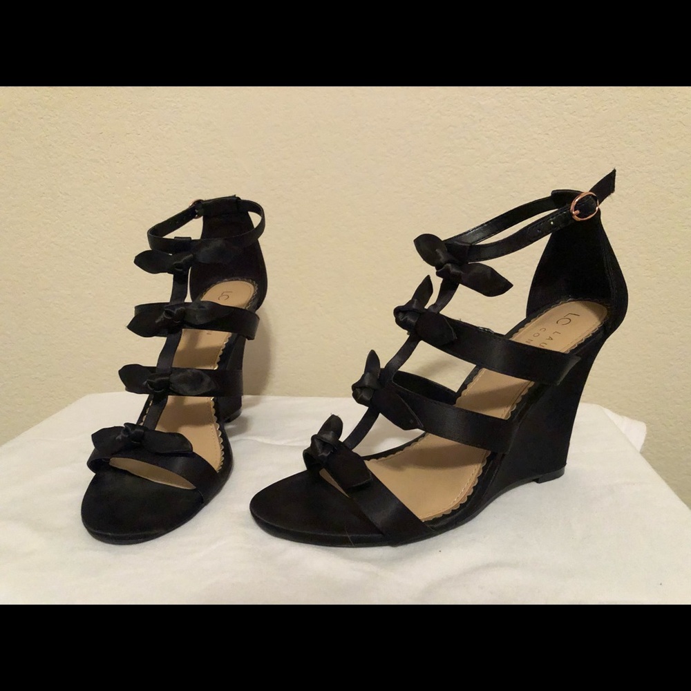 Black bow wedges